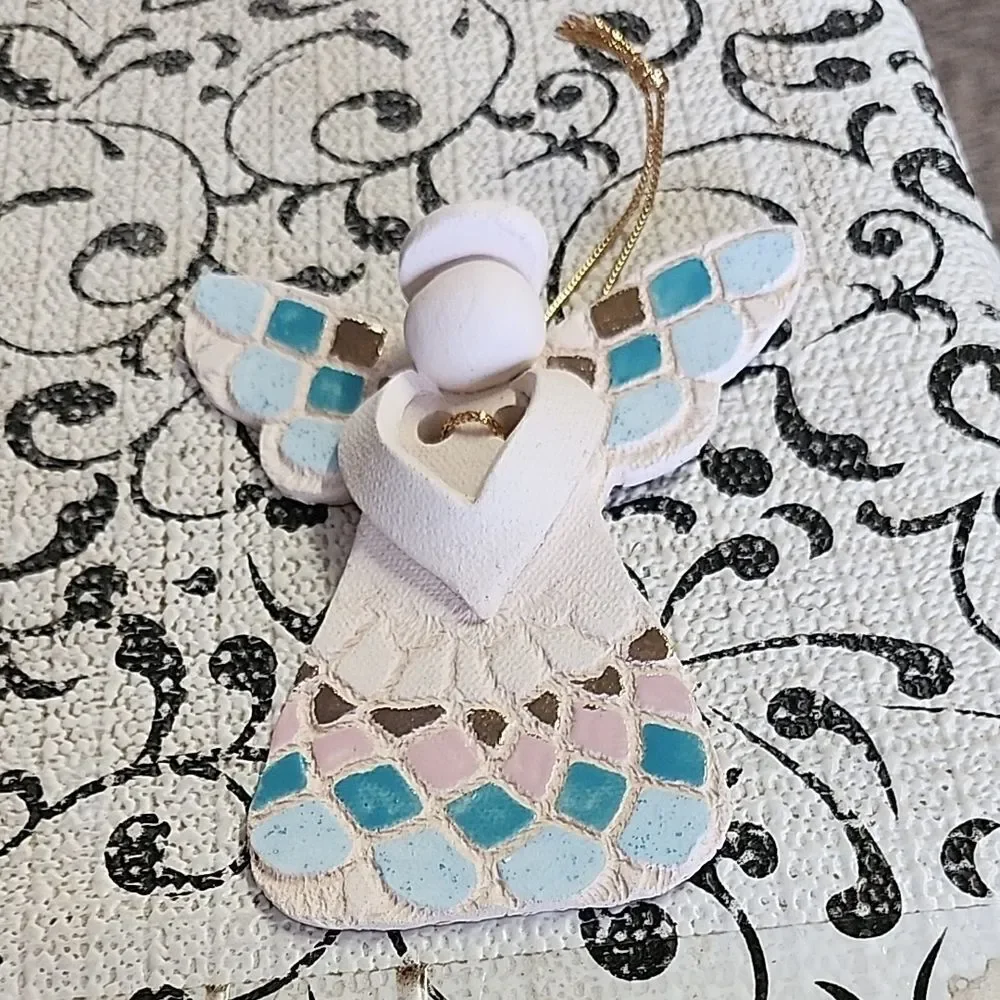 Handcrafted Angel Ornament with Blue and Pink Accents